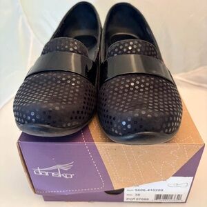 Dansko Black Perforated Slip-Ons